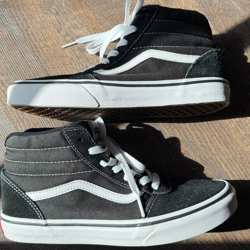Vans Off The Wall Black and White High-Top Skate Sneakers